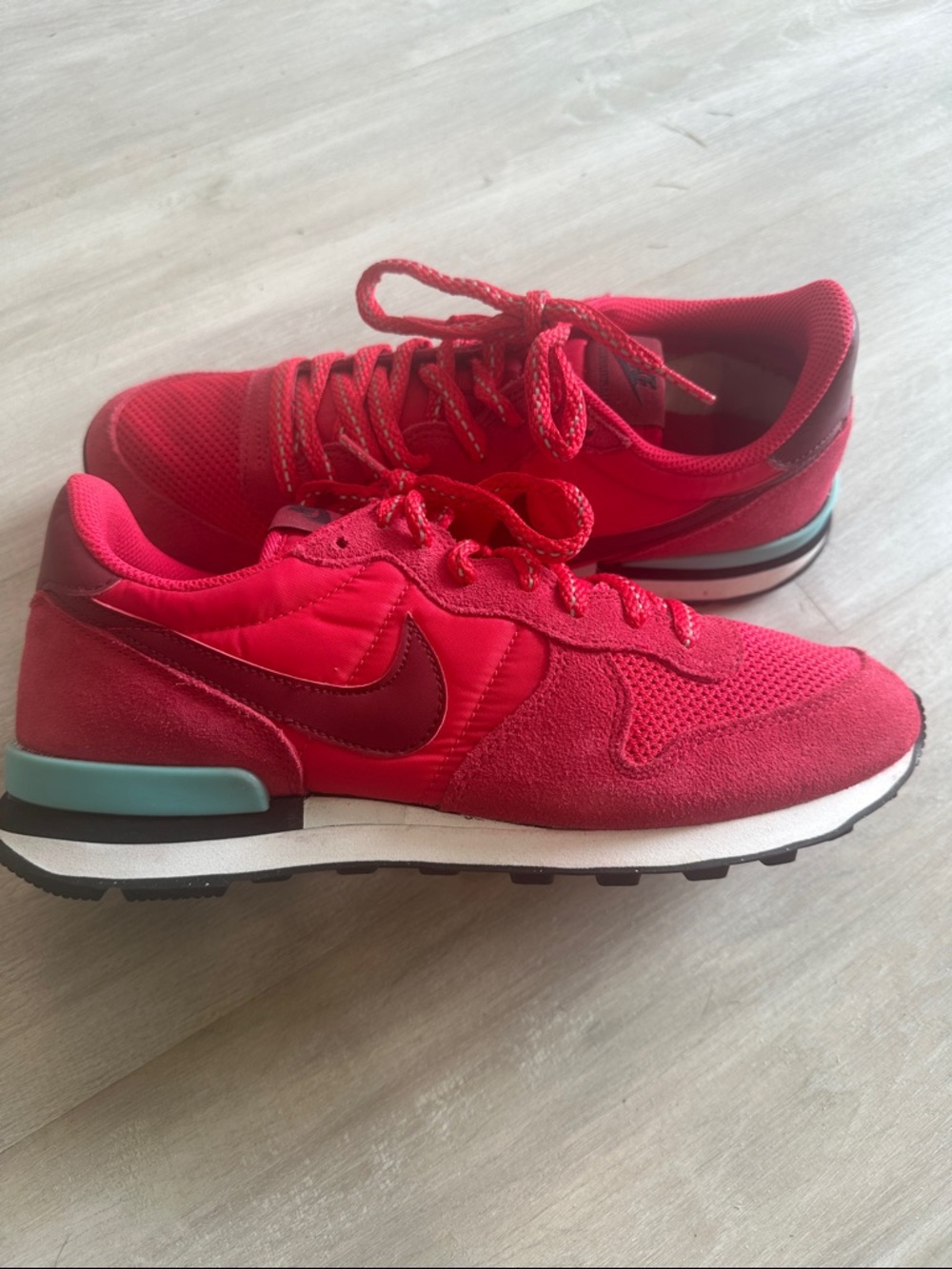 Nike Internationalist Women's Bright Red Retro Runner Sneakers with Teal Accent